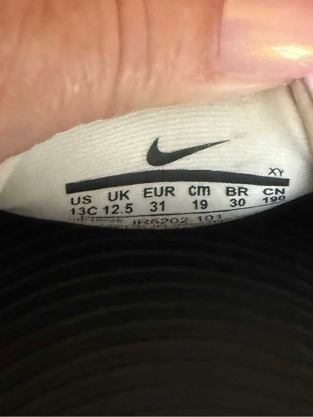 Nike Kids' Black and White Slide Sandals with Orange Logo